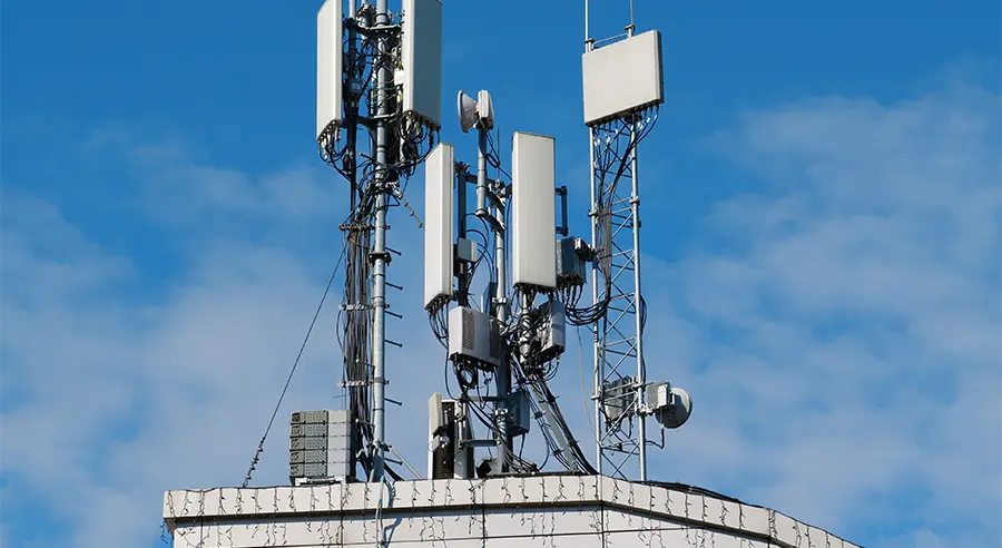 Front view of a 5G cellular network tower.