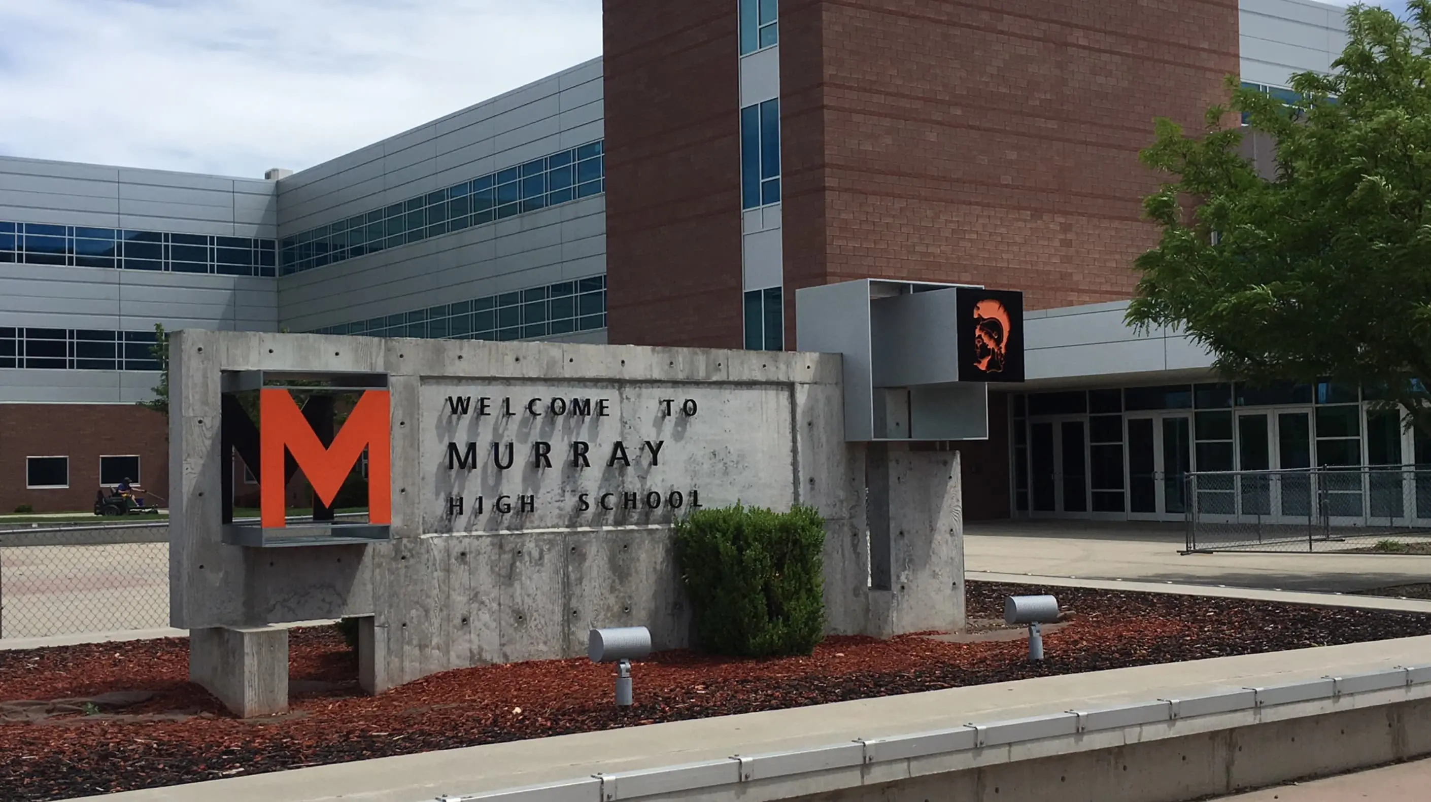 Front view of Murray Highschool with their welcome sign in view.