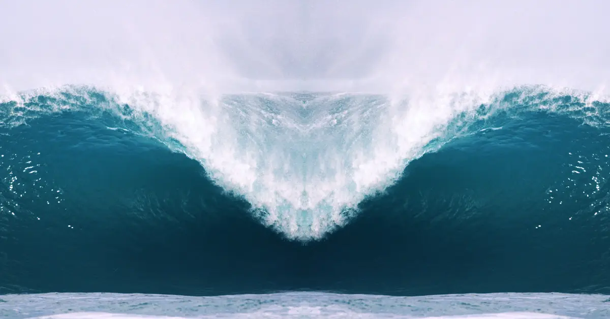 Front view of a large wave crashing down.