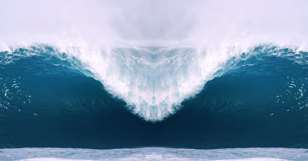 Front view of a large wave crashing down.