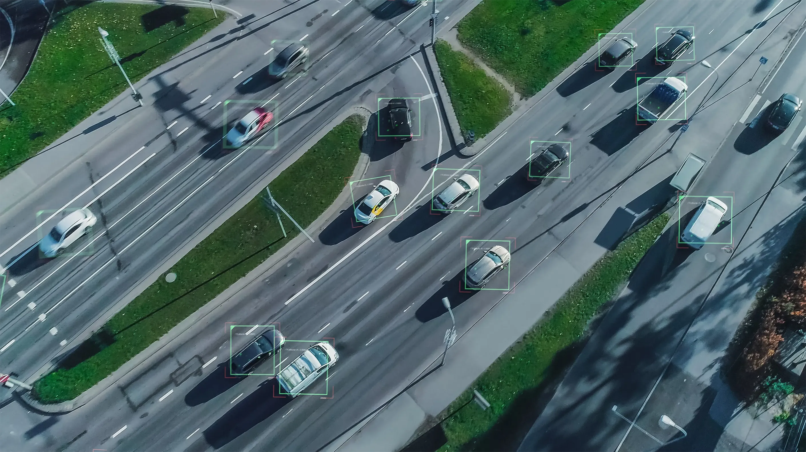 Skyview of multiple vehicles being tracked with edge AI on a freeway.
